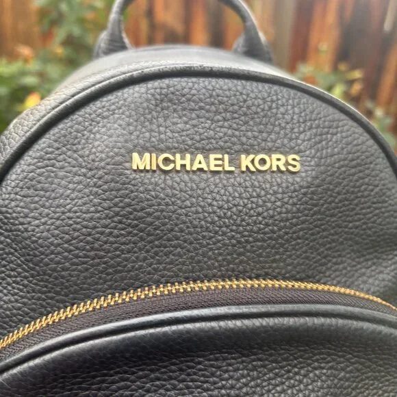 Authentic Michael kors black leather backpack purse